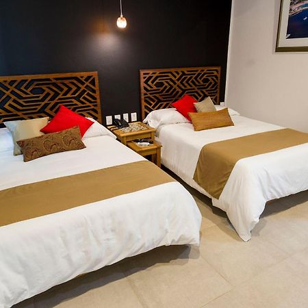 Hotel Dc Boutique & Spa Пуэрто-Эскондидо Номер фото