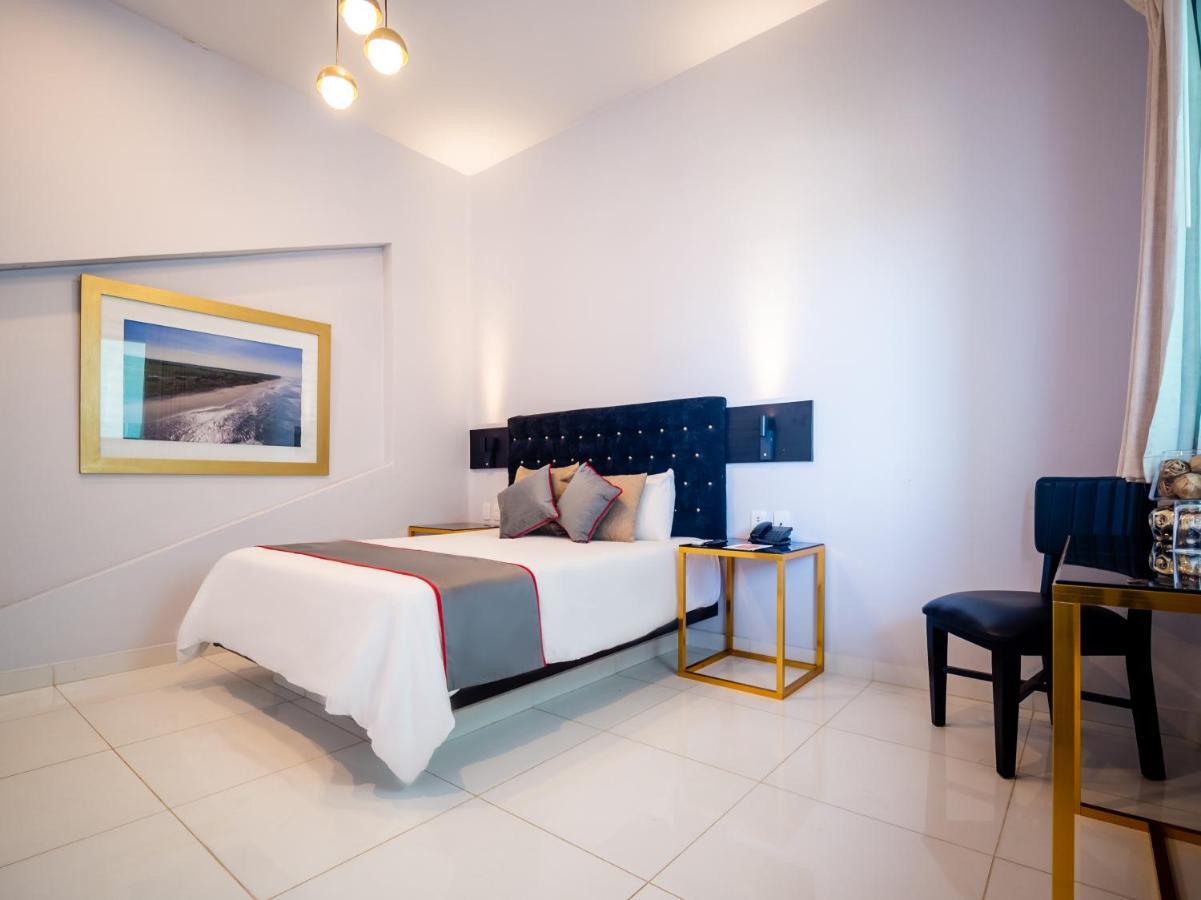 Hotel Dc Boutique & Spa Пуэрто-Эскондидо Экстерьер фото